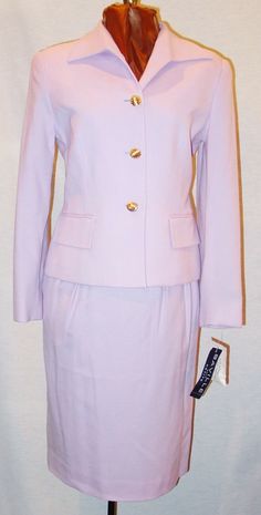 Saville Ladies Light Purple 2 Piece Wool Lined Skirt Suit Size: 6P New with Tags 100% Wool  Dimensions: Jacket: 35" / 89 cm Bust 32" / 81 cm Waist 39" / 99 cm Around Hem 23" / 58 cm Sleeve 21" / 53 cm Length Skirt: 28" / 71 cm +/- 1 1/2" Elastic Waist 38" / 97 cm Hip 38" / 97 cm Hem 24" / 61 cm Length Great Gift!!!!! Don't miss this great designer suit to add to your wardrobe.  Buy several items and save on combined shipping. 3 pounds Shipping Weight Compare at $198.00 I have hundreds of unusual Fitted Career Sets For Fall, Spring Formal Skirt Suit With Pockets, Classic Spring Skirt Suit With Pockets, Fitted Skirt Suit With Pockets For Spring, Winter Career Fitted Skirt Suit, Winter Formal Skirt Suit With Pockets, 70s Office Fashion, Light Purple Suit, 70s Office