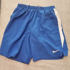 Blue Nike Jogging Shorts Originally Bought For Track But They Don't Fit. Blue Jogging Shorts, Nike Blue Activewear With Built-in Shorts, Blue Stretch Jogging Bottoms, Blue Sportswear Bottoms Short Length, Blue Stretch Bottoms For Jogging, Blue Short Length Sportswear Bottoms, Blue Sports Pants For Summer, Blue Nike Athletic Shorts For Gym, Blue Jogging Shorts For Summer