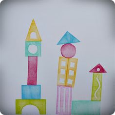 this is a drawing of some buildings with different colors and shapes on them, including a ball in the middle