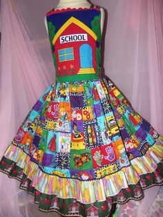 Very cute girl's school day  Dress  Size: 8/9 Length from shoulders to the bottom of dress: 29 inches Adorable  dress, perfect for first day school! Your little girl will love the easy to put on and lightweight fabric. No itchy stitching! Not only will the family love the fun design, but your little darling .. Back To School Books, First Day School, Mannequin Dress, School Books, Fun Design, Day Dress, School Days, Family Love, Dress Fabric