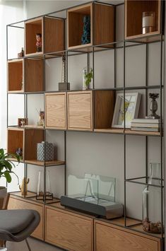 a room with some shelves and furniture in it