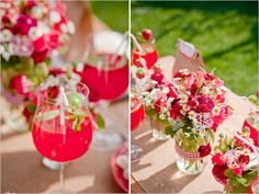 red and green flowers sit in a vase on a plaid tablecloth with pine cones