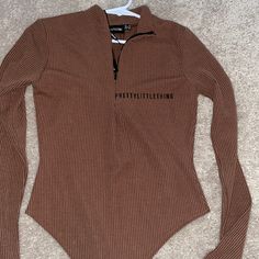 Size Usa 4 Ribbed Half Zip Bodysuit Color Chocolate Brown New Casual Brown Bodysuit For Spring, Trendy Brown Bodysuit For Spring, Trendy Brown Long Sleeve Bodysuit, Fitted Brown Bodysuit For Spring, Trendy Fitted Brown Bodysuit, Zip Bodysuit, Color Chocolate, Pretty Little Thing, Half Zip