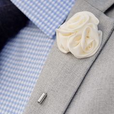 * Ideal gift for a cultivated man
 * Sophisticated and polished design Elegant Flower Shaped Lapel Pin With Floral Decoration, Elegant Flower Lapel Pin With Decoration, Elegant White Flower Lapel Pin, White Flower Lapel Pin For Formal Occasions, Elegant Handmade Flower Lapel Pin For Weddings, Elegant Handmade Flowers Lapel Pin For Weddings, Elegant Wedding Lapel Pin With Handmade Flowers, Classic White Lapel Pin For Formal Occasions, Elegant White Handmade Flower Lapel Pin