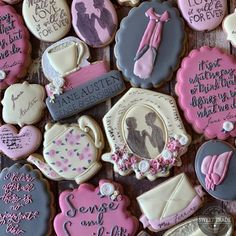 decorated cookies with pink and gray frosting on a table next to each other, including an image of a bride and groom