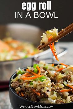 a bowl filled with food and chopsticks sticking out of it