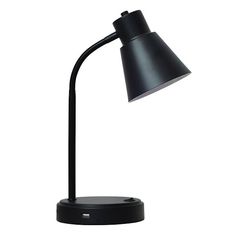 a black desk lamp on a white background with the light turned off and dimming