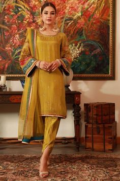 Yellow Silk Traditional Wear With Dabka Work, Traditional Lawn Suit With Dupatta In Tissue Silk, Traditional Tissue Silk Lawn Suit With Dupatta, Traditional Tissue Silk Lawn Suit For Designer Wear, Traditional Tissue Silk Lawn Suit For Diwali, Yellow Anarkali Lawn Suit With Intricate Embroidery, Yellow Unstitched Suit With Intricate Embroidery For Wedding, Traditional Tissue Silk Churidar With Dabka, Traditional Green Tissue Silk Lawn Suit