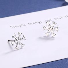 Winter lovers, this snow flake earring is a perfect mix of nature's art with a sterling silver finish. Hypoallergenic and lead-free, the whole art making process is unique to nature's jewelry making so each piece feels life like. This earring will keep you warm all through the winter season. Give your style a wintery persona with these stunning, high polished snow flake earrings. Hand crafted out of sterling silver and set with amazing snow flake crystals, these beautiful earrings will be the pe Silver Jewelry As Winter Gift, Sterling Silver Snowflake Jewelry For Winter, Silver Jewelry For Winter Gift, Sterling Silver Jewelry For Winter Gifts, Sterling Silver Snowflake Jewelry, Round Winter Jewelry Gift, Round Jewelry Gift For Winter, Silver Jewelry Christmas Gift For Her, Sterling Silver Snowflake Earrings