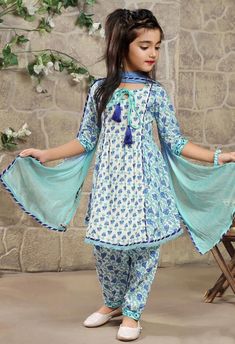 Reinvigorate your little kids wardrobe with this white and blue printed salwar suit. Tailored from cotton, it features gota work detailing, and is accented with a keyhole neck and quarter sleeves, comes with a dupatta. Slight color variation is possible due to digital photography. Being rewarded as the most trusted brand our customers too believe we deliver the same styles as promised on the website. Product Details Dispatch in 2 DAYS Fabric Cotton Work Gota Style Printed Occasion Festival   Size & Fit Neck Keyhole Neck Sleeve Quarter Sleeves Weight 1.50 Kg Country Of Origin: India Fairies Dresses, Blue Salwar Suit, Printed Salwar Suit, Frock Designs For Girl, Dress Designing Ideas, Dress Designing, Girls Dresses Sewing, Designing Ideas