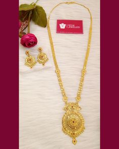 24 carat gold plated ruby indian set with earrings. Long haram. Wedding wear. A best replica of original gold sets. 100% real look. Perfect for any occasion. More variety on our shop. For any enquiries feel free to contact us. Please provide detailed address with contact number when order is placed as it is required on shipping label. Gold Plated Jewelry Sets For Puja, Gold-plated Jewelry Sets For Puja, Bollywood Style Yellow Gold Plated Jewelry Sets, Heavy Yellow Gold Plated Jewelry Sets, Hallmarked Gold-plated Jewelry Sets For Festivals, Gold Ruby Jewelry For Diwali, Gold Long Set Design, Gold Ruby Temple Necklace For Diwali, Gold Ruby Jewelry Sets For Wedding