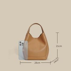 MATERIAL - Made of 100% high quality genuine leather, solid color,feels cosy to touch,delicate, durable. The hardware parts are made of cast molding thick hardware, top metal hardware. The stitching is well-made, firm and smooth.DIMENSIONS - 11L*5.5W*8.3H(inch) / 28L*14W*21H(cm).STRUCTURE - This handbag contains 1 main compartment, 1 small cloth bag. Comfortably holds wallet, mobile phone, cosmetics, keys, charge, essentials and so on.FUNCTIONAL - Come with an adjustable long strap, can be handb Classic Solid Color Hobo Bag For Daily Use, Solid Color Bucket Hobo Bag For Office, Office Bag With Solid Color And Smooth Grain, Office Bag With Smooth Grain, Leather Shoulder Bag With Metal Hardware And Double Handle, Classic Leather Hobo Bag In Solid Color, Solid Color Office Bag With Smooth Grain, Beige Square Leather Hobo Bag, Elegant Square Leather Hobo Bag