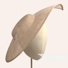 Get Royal Ascot ready with this extra large pointed tip Latte Brown sinamay fascinator base! Made from a triple layer of stiffened sinamay millinery fabric and is ideal for making an instant hat. This shape has a lovely pointed tip and a shallow crown. Get creative by positioning it at different angles on the head! Just add a headband for securing to the head (not included but available in our shop!) *This is not a fitted hat! You will need to sew in a headband or comb to attach it to your head* Fitted Sinamay Boater Hat With Curved Brim, Brimmed Sinamay Fascinator For Church, Fitted Sinamay Straw Hat With Curved Brim, Elegant Fitted Natural Boater Hat, Sinamay Fascinator With Curved Brim For Royal Ascot, Fitted Sinamay Fascinator For Summer, Summer Sinamay Fascinator, Fitted, Fitted Sinamay Fascinator For Church, Summer Fitted Sinamay Fascinator