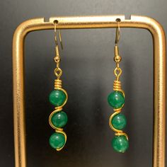 Handmade Wire Wrapped Dyed Green Jade 6mm Bead Earrings. Measures Approximately 2" In Length. Item Is Handmade And May Have Slight Imperfections. #2874 Jade Beaded Earrings For Jewelry Making, Adjustable Jade Beaded Earrings As A Gift, Adjustable Green Beaded Earrings With Natural Stones, Adjustable Round Beads Jade Earrings, Jade Beaded Earrings With Ear Wire As Gift, Jade Beaded Earrings With Ear Wire For Gifts, Jade Beaded Earrings As Gift, Jade Earrings With Gemstone Beads, Pearl Statement Earrings