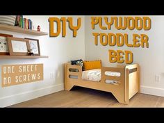 a kid's bedroom with wooden bed and shelves