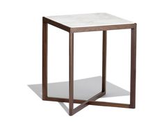 the side table is made out of wood and marble, with a square shaped top