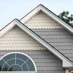 an image of a house that is painted gray