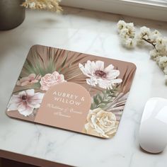 a personalized mouse pad with flowers on it