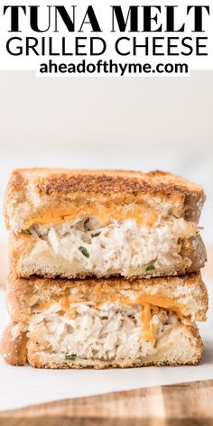 two grilled cheese sandwiches stacked on top of each other with text overlay that reads tuna melt grilled cheese