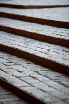 some brown and white bricks on the ground