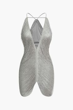 a grey top with an open back on a hanger in front of a white background