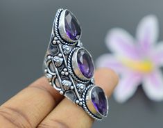 "Boho Faceted Amethyst Gemstone Ring\\ Natural Amethyst Gemstone Ring\\ Natural Gemstone Ring\\ Gemstone Ring\\ Ring For Her\\ Vintage Gift ideas Material : Brass Gemstones name : Amethyst  Color : As Pictured   Metal polish : Silver oxidized  \"If you have any queries about our item then Please contact Us \" HAVE A HAPPY SHOPPING WITH US ! THANK YOU" Three Stone Amethyst Jewelry Gift, Three Stone Amethyst Ring, Amethyst Three Stone Jewelry Gift, Oval Amethyst Ring With Stones, Three Stone Amethyst Ring As A Gift, Amethyst Three Stone Ring, Oval Amethyst Rings With Stones, Three Stone Amethyst Jewelry, Three Stone Amethyst Ring Gift