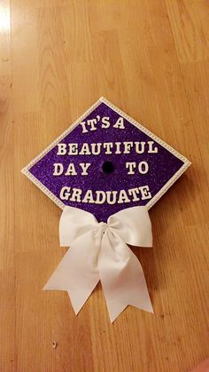 a purple graduation cap that says it's a beautiful day to graduate