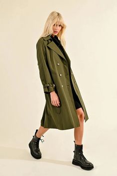 Cool fall days call for this classic trench coat featuring a belted waist, belted cuff details, and a double breasted silhouette. Button front closure Yoke at the back Adjustable wait belt Lined True to size Classic Trench Coat, Fall Days, Long Trench, Belted Trench Coat, Cuff Detail, Autumn Day, Denim Dress, Double Breasted, Jumpsuit Dress