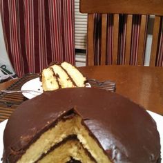 a chocolate cake cut in half on a plate