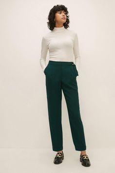 Tailored fit for a polished, feminine silhouette crepe fabric with a luxurious drape Flattering high-waisted design Sleek belt loops and a D-ring belt Versatile ankle-grazing length Exuding sophistication, these tailored crepe trousers from Oasis are a versatile workwear essential. The fabric drapes beautifully, while the high-waisted cut and belt detail create a flattering silhouette. Style them with a crisp blouse and blazer for a polished office look, or pair them with a silk camisole and heels for an effortlessly chic evening ensemble. Crepe Trousers, Workwear Essentials, Velvet Clothes, Sequin Outfit, Fall 24, Outfit Formulas, Oasis Fashion, Versatile Wardrobe, Silk Camisole