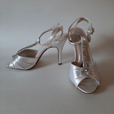 These Gorgeous White Bridal Heels Have A Rhinestone Strap With A Teardrop Accent. These Have Never Been Worn. Heel Height 10 Cm/ 4" Fitted Open Toe Wedding Shoes With Rhinestones, Elegant Bedazzled Heels For Wedding, Elegant Bedazzled White Wedding Shoes, Elegant Rhinestone Wedding Shoes For Reception, Elegant Rhinestone Wedding Shoes, Elegant Rhinestone Wedding Reception Shoes, Formal Fitted Wedding Shoes With Rhinestones, Short White Heels, White Bridal Heels