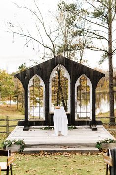 a black and white wedding ceremony set up