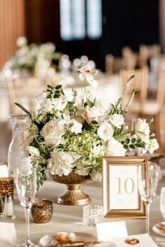 Gold Framed Wedding Table Number & Elegant White Centerpiece for classic elegant wedding at Scottish Rite Cathedral Wedding in downtown Indianapolis Gold Frame Table Number, Gold Vase Centerpieces Wedding, Gold And Wood Wedding Decor, Gold And White Wedding Centerpieces, Gold Wedding Centerpieces Elegant, Vintage Gold Wedding Decor, Vintage Wedding Table Numbers, Gold Frame Table Numbers Wedding, Classy Table Numbers