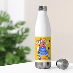 a stainless steel bottle with a cartoon cow on it and a screwdriver next to it