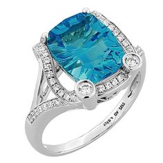 Beautiful Swiss-Blue Topaz ring accented by forty-one brilliant-cut round Diamonds, extending to shank, weighing approx. 0.60 ct., Concave Cushion facet-cut Swiss-Blue Topaz measures approx. 11mmx9mm, approx. weight 5.16 ct.; mounted in 14k white gold with open gallery. Ring size: 7+. A Chic complement to your outfit! Heart Shaped Wedding Rings, Swiss Blue Topaz Ring, Rings Antique, Diamond Gold Ring, Real Gold Jewelry, Gold Solitaire Ring, Fine Diamond Jewelry, Colorless Diamond, Custom Ring Designs