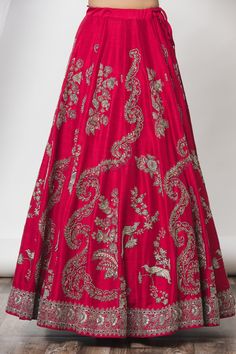 Red lehenga with floral embroidered motifs and side seashell tie-up. Paired with floral embroidered blouse.
Component: 2
Pattern: Embroidered
Type Of Work: Floral
Neckline: Leaf
Sleeve Type: Elbow Sleeves
Color: Red
Other Details: 
Cutwork detail
Floral motifs
Occasion: Sangeet,Wedding - Aza Fashions Formal Raw Silk Lehenga With Intricate Embroidery, Formal Embroidered Raw Silk Lehenga, Formal Embroidered Silk Lehenga, Formal Embroidered Festive Lehenga, Formal Festive Embroidered Lehenga, Festive Formal Embroidered Lehenga, Formal Lehenga With Dori Work And Traditional Drape, Embroidered Wedding Skirt, Red Sharara With Intricate Embroidery For Formal Occasions