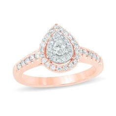 A unique choice she’ll love, this diamond engagement ring elevates her style. Crafted in 14K rose gold, this intriguing design features a sparkling 1/8 pear-shaped diamond wrapped in two diamond-adorned pear-shaped halo frames. A shimmering diamond-lined shank completes the lovely look. Radiant with 1/2 ct. t.w. of diamonds and a bright polished shine, this engagement ring is destined to delight. Rose Gold Teardrop Diamond Ring, Rose Gold Pear-shaped Diamond Ring With Prong Setting, Pear Shaped Diamond Ring In Rose Gold, Rose Gold Teardrop Diamond Ring With Prong Setting, Pear-shaped Rose Gold Diamond Ring With Halo Setting, Double Frame, Pear Cut Diamond, Pear Shaped Diamond, Diamond Clarity