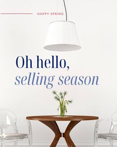 a dining room table with chairs and a lamp hanging above it that says, oh hello, selling season