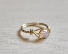 Rose quartz ring wire ring wire wrapped ring gemstone wire | Etsy Delicate Wire Wrapped Jewelry, Delicate Wire Wrapped Promise Ring, Delicate Wire Wrapped Ring Jewelry, Elegant Wire Wrapped Crystal Ring For Wedding, Adjustable Rose Gold Wire Wrapped Ring, Dainty Wire Wrapped Crystal Ring, Minimalist Wire Wrapped Crystal Ring, Wire Wrapped Rose Quartz Round Jewelry, Rose Quartz Ring Wire