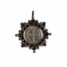 Exquisitely crafted to perfection, the Cloister collection from Virgins Saints & Angels draws inspiration from centuries of spirituality, superstition, and the allure of good fortune. Fashioned from plated bronze and encased in resilient resin, our classic San Benito Charm Medallion pays homage to Saint Benedict, a beacon of peace and unwavering conviction. This timeless medallion, designed for versatility, can be effortlessly attached to our chains or beaded necklaces, allowing you to personali Luxury Collectible Bronze Jewelry, Luxury Polished Bronze Jewelry, Luxury Engraved Bronze Jewelry, Spiritual Coin-shaped Charms Jewelry, Spiritual Coin Charms Jewelry, Spiritual Coin Charm Jewelry, Luxury Bronze Pendant Jewelry, Elegant Commemoration Jewelry With Charms, Bronze Medallion Jewelry For Commemoration