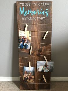 the best thing about memories is making them smile with pictures pinned to clothes pins on a wooden board