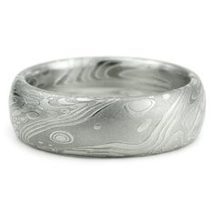 Damascus Stainless Steel Mens Wedding Band by MokumeDamascusRings I think this might be the one!!! Artisan Engraved Ring For Wedding, Masculine Rings, Band Ring Designs, Damascus Steel Wedding Band, Flowing Pattern, Gorgeous Wedding Rings, Waves Pattern, Alternative Wedding Rings, Country Stuff