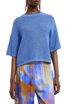 Balmy breezes flow through an open-stitch sweater knit from cotton yarn in an on-trend boxy silhouette. 20" length (size Small) Crewneck Elbow-length sleeves Ribbed cuffs and hem Semisheer 100% cotton Dry clean Imported Blue Knitted Top With Relaxed Fit, Blue Cotton Open Knit Sweater, Blue Pointelle Knit Crew Neck Sweater, Blue Crew Neck Summer Sweater, Blue Crew Neck Sweater For Summer, Blue Relaxed Fit Knit Top, Blue Relaxed Fit Casual Knit Top, Blue Oversized Knit Top, Casual Blue Textured Knit Top