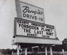 the marquee sign for benques drive - in is shown