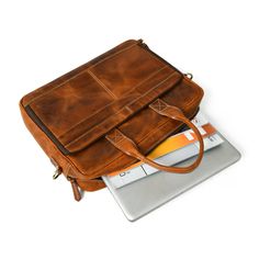 Elevate your professional presence with our Bison Elite Briefcase, meticulously crafted for a stylish edge. Fashioned from the finest full-grain buffalo leather, this masterpiece offers exceptional durability and a unique texture. Designed with capacious compartments and organizational elements, it seamlessly combines practicality with opulence. Its rich brown tone, complemented by striking orange accents, exudes undeniable sophistication, making it a perfect addition to any ensemble. Embrace th Professional Leather Satchel For Everyday Use, Classic Cases With Leather Lining For Daily Use, Professional Leather Satchel For Daily Use, Professional Leather Laptop Bag For Everyday Use, Classic Leather Laptop Case, Classic Leather Satchel Case, Classic Brown Laptop Case, Professional Leather Rectangular Satchel, Professional Rectangular Leather Satchel