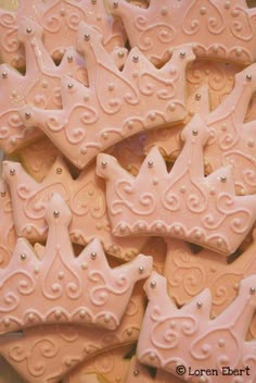 decorated cookies in the shape of princess crowns