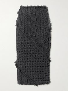 Alexander McQueen's midi skirt debuted on the Fall '24 runway with the matching cardigan and bralette. It's cable-knitted from a rich wool-blend and has slightly frayed edges. Runway Knitwear, Cable Knit Skirt, Flat Dress Shoes, Dress Flats, Sport Swimwear, Crochet Skirt, Gray Skirt, Knit Skirt, Everyday Wardrobe