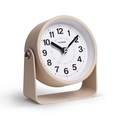 an alarm clock is shown on a white background