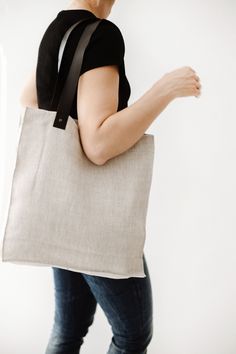 "● STRONG and DURABLE MATERIAL. Linen has a value of timelessness, so you can be sure that this organic tote bag is for a long use. ● STRONG HANDLES. Handles are with rivets which guarantees safe, secure and long-lasting use. ● INNER POCKET with ZIPPER. Your small things (keys, wallet etc.) will be safe while you're shopping or taking your things with you. ● CLASSIC COLORS. The natural linen color is perfect mostly with everything. ● ECOFRIENDLY. Linen fabrics meet OEKO-TEX 100 standards. ● SIMP Tote Bag With Zipper, Linen Tote Bag, Bag With Pockets, Tote Bag With Pockets, Grey Tote Bags, Grocery Tote Bag, Market Tote Bag, Grey Tote, Grocery Tote