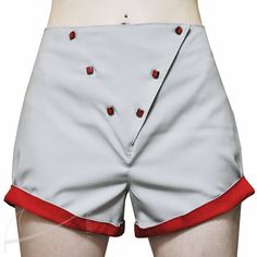 "Envelope design shorts done up  with red small buttons. Size: 38(M) (size of the waist: 70-72 cm, hip size: 92-94 cm). Measurements: length of the shorts legs, measured along inside seam: 8 cm, along side seam: 30 cm, width of the shorts legs: 61 cm. Orders: possible to order in any size, time required to complete order one week.  Textile: wool. Colors: grey and red. Design: envelope, done up with small buttons, wider design legs. Two small pockets in side seams. Height of shorts to the line of Fitted Buttoned Shorts, Red Cotton Bottoms With Buttons, Fitted High-waisted Shorts With Button Closure, Red Button Closure Bottoms For Summer, Fitted Short Pants With Button Closure, Red Summer Bottoms With Button Closure, Summer Red Bottoms With Button Closure, Red Bottoms With Belt Loops And Short Length, Red Shorts With Belt Loops